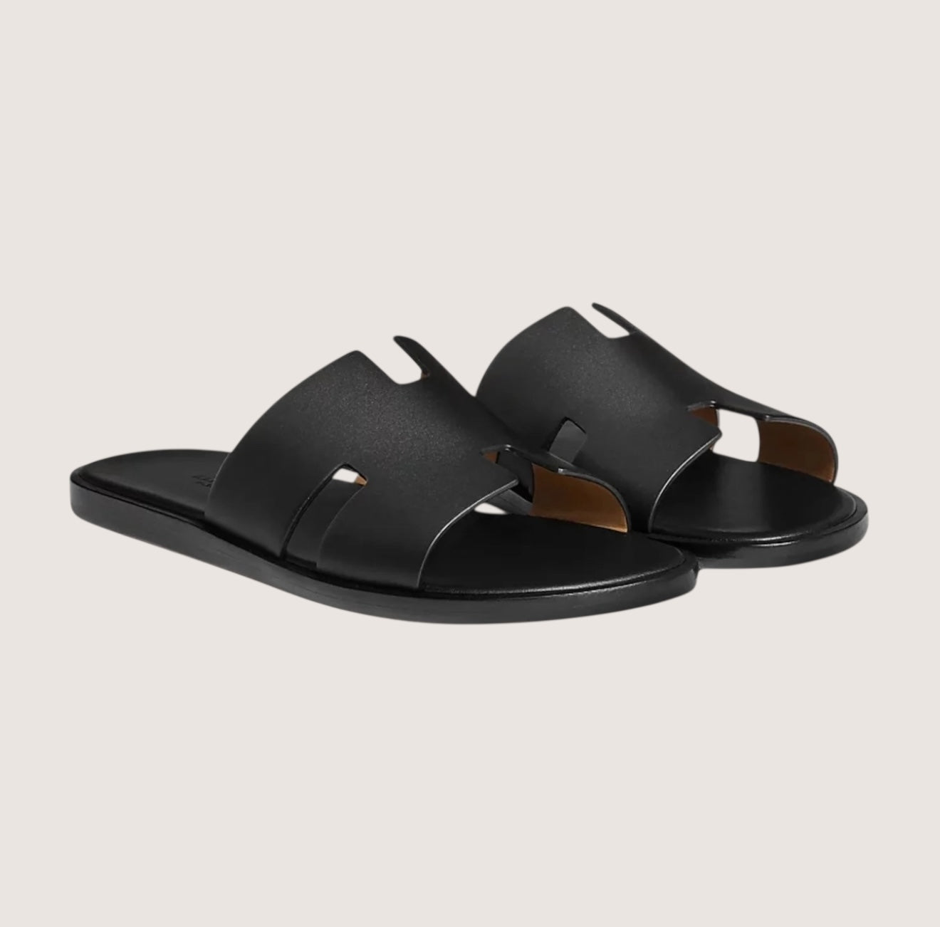 Men's black leather slide sandals featuring a cushioned insole and open-toe design, perfect for casual and smart-casual occasions. 0